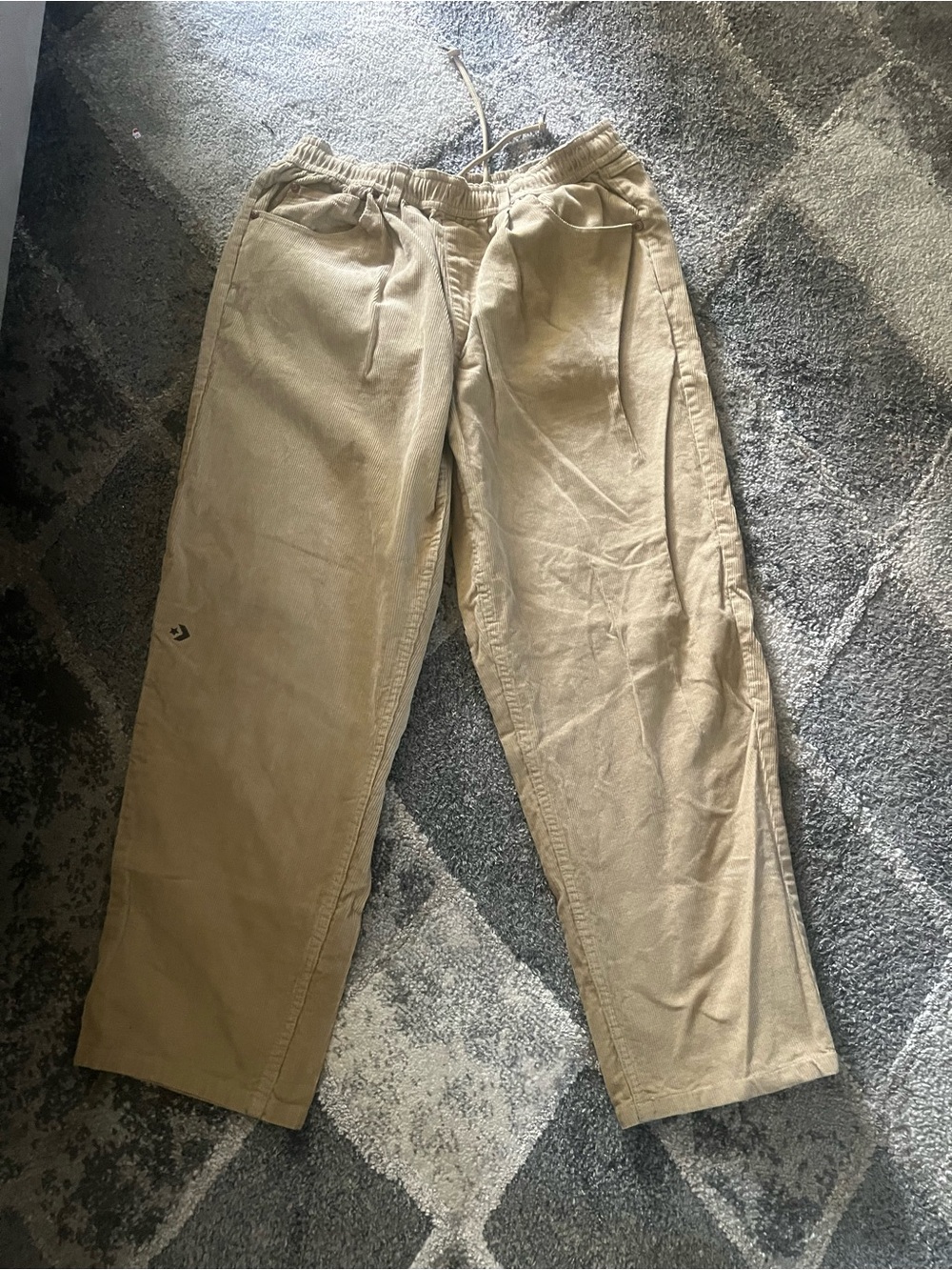 Converse Recycled Corduroy pants feature an embroidered star on the right leg.